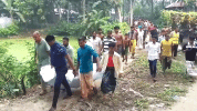 হলুদ ক্ষেতে মিলল ব্যবসায়ীর ঝলসানো লাশ